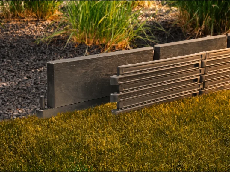 Bordures de jardin KitBordure anthracite séparant pelouse et massif de graminées